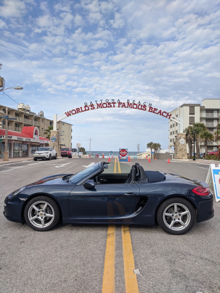 Porsche Boxster at World's Most Famous Beach Sign in Daytona Beach
