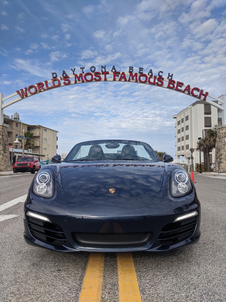 Porsche Boxster at World's Most Famous Beach Sign in Daytona Beach